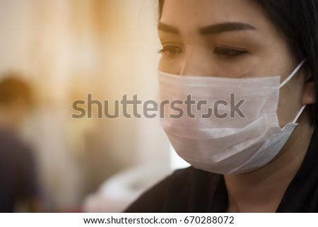 Asian women wearing a dust mask