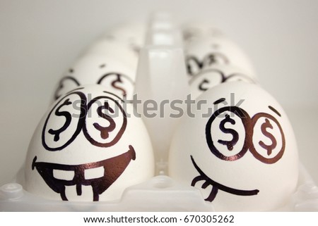 Business concept team training. Startup. Eggs with a painted face. Photo for your design