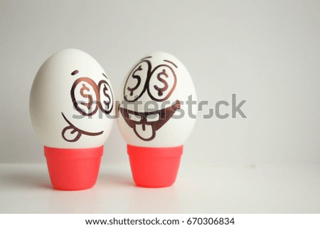 Concept of business ideas. Startup. Eggs with painted face.