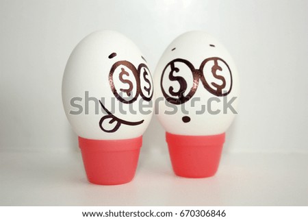 Concept of business ideas. failure. Eggs with painted face.