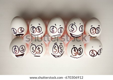 Concept of business training. Seminars and lectures. Eggs with painted face.