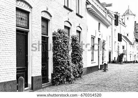 Historic buildings in the city of Amersfoort. Typical Dutch brick houses in Holland. Black and white picture