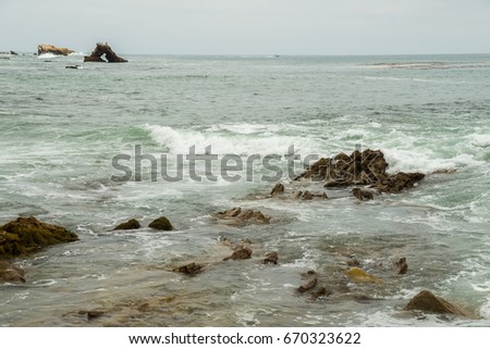 Section of the jagged rocky shoreline of Laguna Beach, California.