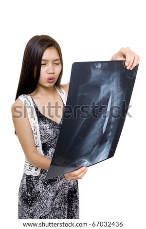 woman seems to be concerned about an x-ray picture, isolated on white background