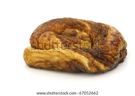 traditional Dutch cinnamon and sugar roll called "Zeeuwse bolus" on a white background Royalty-Free Stock Photo #67052662
