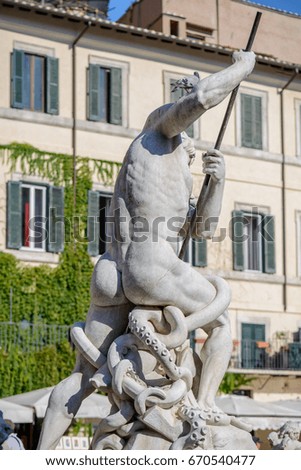particular of the tritorn fountain in Navona square Rome