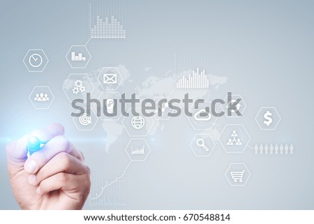 Business and technology concept. Graphs and icons on virtual screen background.