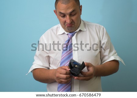 Businessman well-dressed with empty wallet