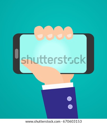 Hand holding phone with white screen 