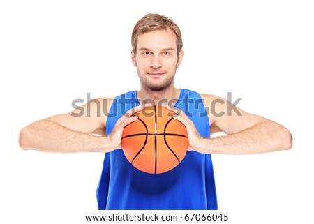 Young basketball player posing with a basketball isolated on white background