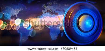  Camera lens looks at the world. Media news background. Elements of this image furnished by NASA.