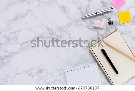 Modern mock up flat lay of notebook and stationery on white marble texture background - Concept of creative work space 