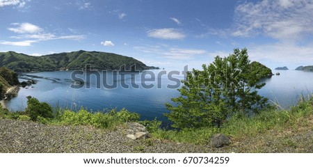 Panoramic view of japan sea with mountain blue sky and cloud