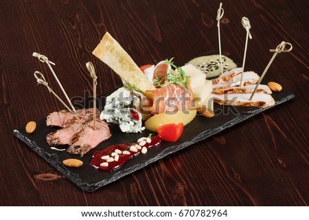The Ultimate Appetizer Board with cheese and meat