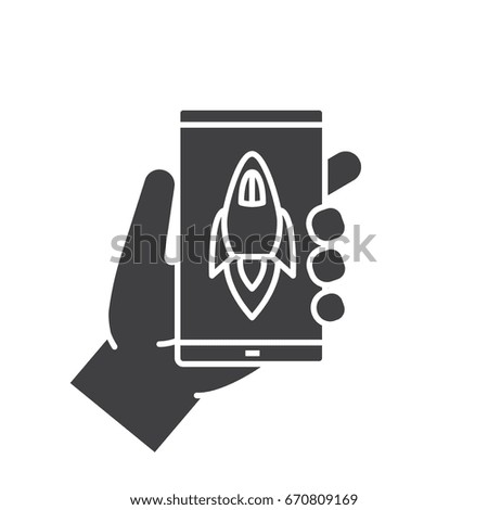Hand holding smartphone glyph icon. Silhouette symbol. Smart phone boost app. Negative space. Vector isolated illustration