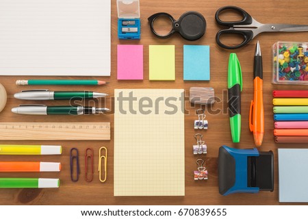School office supplies on a table Royalty-Free Stock Photo #670839655