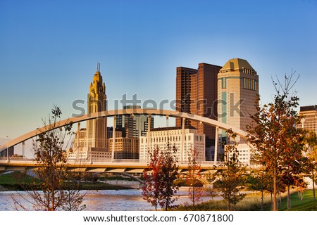 The Columbus, Ohio skyline in the fall with the Main Street Bridge in the foreground