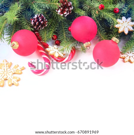 New year background with red balls, gingerbread and fir-tree