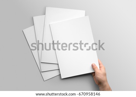 Blank A4 photorealistic brochure mockup on light grey background.  Royalty-Free Stock Photo #670958146