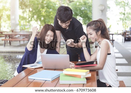 Group of young students happiness when finished homework and report in school.