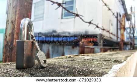 key on the wall and barbed wire,photo create for freedom concept