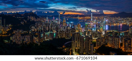 Hong Kong city skyline at sunset and twilight, panorama view from Jardine's Lookout,  Wilson Trail and Hong Kong Trail.