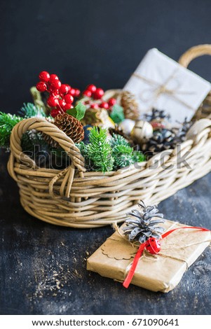 Christmas presents in rustic style with holiday decorations, selective focus