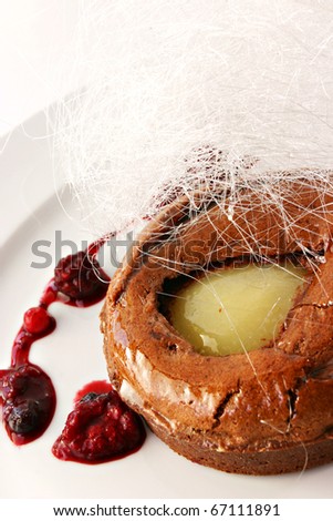 apple pie with raspberry and sugar decoration