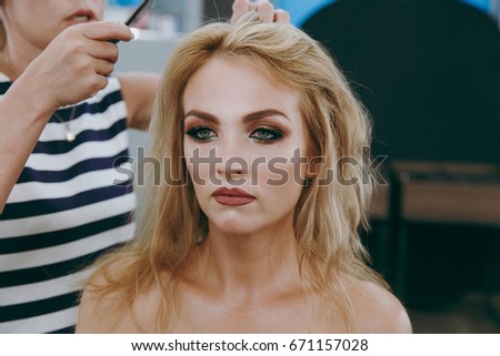 Make-up and hairstyle for a girl


