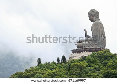 Big Buddha over the mountain In Hong Kong 