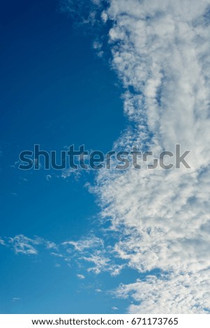 image of blue sky and white cloud on day time for background usage.(vertical).