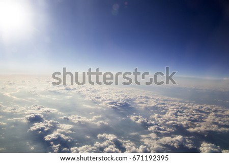 photo of View of Clouds and sky from airplane window