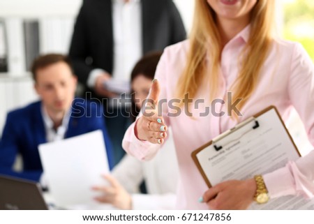 Businesswoman offer hand to shake as hello in office closeup. Serious business, friendly support service, excellent prospect, introduction or thanks gesture, gratitude, invite to participate concept