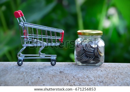 Conceptual photo of correlation between theme of shopping, savings, budgeting, banking and financial matter.