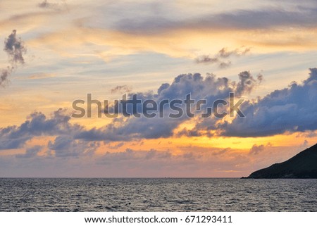 Sea with beautiful sunset and cloud background