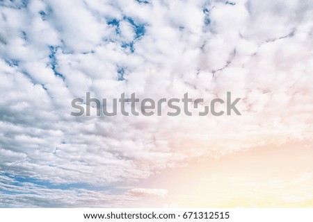 White fluffy clouds background. The horizontal frame.
