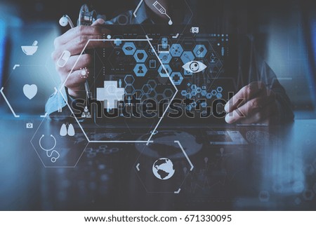 medical technology concept,smart doctor hand working with modern laptop computer in modern office with virtual icon diagram