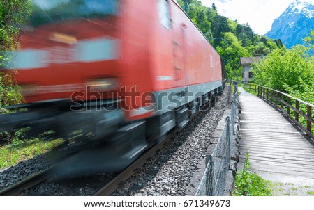 Train on the railway. Blurred motion.