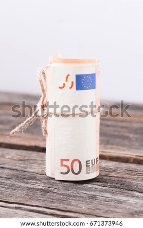 Euro on a wooden background