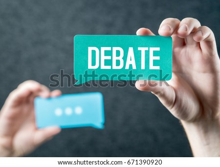 Debate, argument, controversy and disputation concept. Learning to be better speaker. Education to improve dialog. Tell opinions and thoughts in public. Hands holding cardboard speech bubble. Royalty-Free Stock Photo #671390920