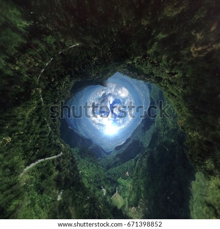 Little tiny planet picture style. spherical view of big green forrest mountain with sky and clouds in daylight summer season. abstract background. vivid colorful filtered. square image