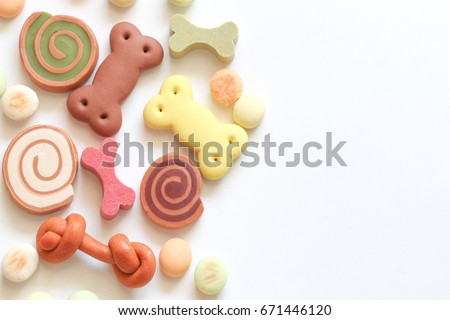 Delicious of dog biscuits , dog snack or dog  chew copy space on the white background, Can use background , Advertising for pet food. Royalty-Free Stock Photo #671446120