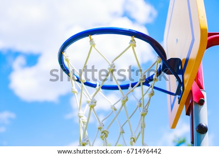 Basketball ring on blue sky background

