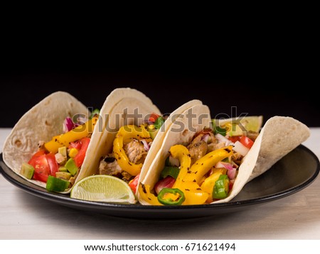 Tacos on pita. Mexican food background. Top view. Copy space and text area.
