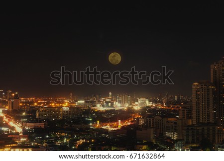 Full moon Bangkok night view with skyscraper in business district in Bangkok Thailand