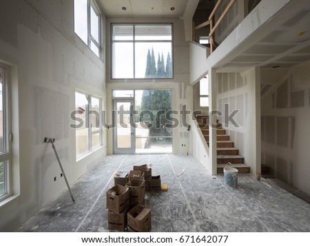Room interior with drywall completely installed Royalty-Free Stock Photo #671642077