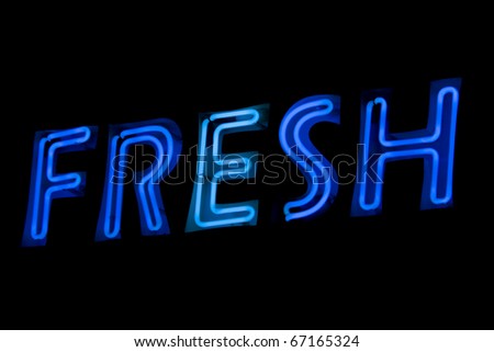 Neon sign showing the word Fresh