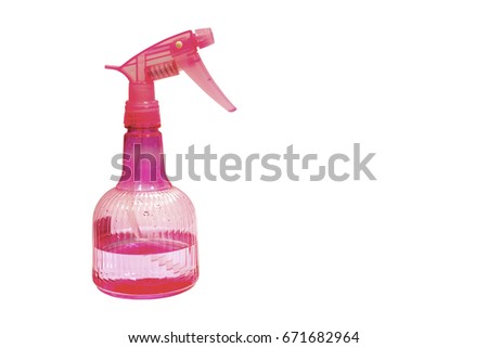 Pink plastic spray bottle isolated on white background.
