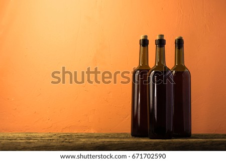 Bottle with red wine on a beautiful background