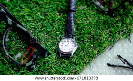 Clock with grass